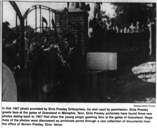Elvis greets fans at the gates of Graceland